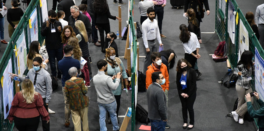 Overhead view of multiple students' presentation stations at the 2022 Undergraduate Research Forum